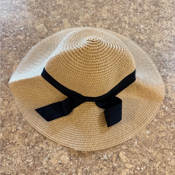Elegant Tan Sun Hat with Black Ribbon - Picture 2 of 3
